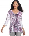 A striking sublimated print and asymmetrical hemline give this top a stylish boost! From Style&co. for Susan G. Komen.
