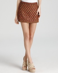 Make it a date night to remember in a neon Gryphon mini skirt, accented by a slim, silk blouse and neutral, nude sandals that highlight the illuminating style. Make it a date night to remember in a neon Gryphon mini skirt, accented by a slim, silk blouse and neutral, nude sandals that highlight the illuminating style.
