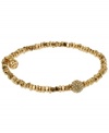 This season's most on-trend accessories are the ones perfect for stacking. Michael Kors' sleek, stretchable style combines gold beading with a pave crystal fireball for ultimate shimmer and shine. Crafted in gold tone mixed metal. Approximate diameter: 2/1/4 inches. Approximate width: 1/8 inch.