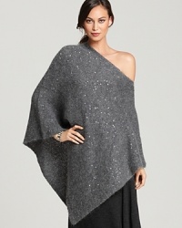 Dripping with dazzling sequins, this Eileen Fisher poncho puts your style in the spotlight.