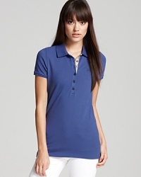 A check-lined placket shakes up the essential Burberry Brit polo shirt. Keep the look strong with sleek black denim for a strikingly modern approach to classic sportswear. A check-lined placket shakes up the essential Burberry Brit polo shirt. Keep the look strong with sleek black denim for a strikingly modern approach to classic sportswear.