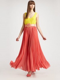 Vibrant colorblock crepe pleated from top to hem and cinched at the waist by a wide buckled belt.ScoopneckSleevelessBlouson bodiceWide beltScoopbackCenter back zipperAbout 40 from natural waistPolyesterDry cleanMade in USAModel shown is 5'10 (177cm) wearing US size 4. Vibrant colorblock crepe pleated from top to hem and cinched at the waist by a wide buckled belt.ScoopneckSleevelessBlouson bodiceWide beltScoopbackCenter back zipperAbout 40 from natural waistPolyesterDry cleanMade in USAModel shown is 5'10 (177cm) wearing US size 4.