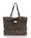 You'll want this trend-smart tote Fur Sure: plush faux fur in earthy hues with chain-wrapped handles. So now.