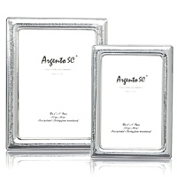 Argento hammered sterling silver frame. Dual easel for portrait and landscape tabletop display. Solid .925 fine sterling silver. Clear lacquered for tarnish free appearance.