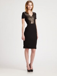 Edgy chic, this dress with a fascinating leather detail is a winner.V-necklineShort sleevesBack zipperAbout 25 from natural waist84% viscose/11% polyamide/5% elastaneDry clean by leather specialistMade in ItalyModel shown is 5'10½ (179cm) wearing US size 4. OUR FIT MODEL RECOMMENDS ordering true size. Edgy chic, this dress with a fascinating leather detail is a winner.V-necklineShort sleevesBack zipperAbout 25 from natural waist84% viscose/11% polyamide/5% elastaneDry clean by leather specialistMade in ItalyModel shown is 5'10½ (179cm) wearing US size 4. OUR FIT MODEL RECOMMENDS ordering true size.