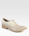 Superior craftsmanship takes the extra step towards signature style with this vintage-inspired, perforated design.Leather/canvas upperLeather liningPadded insoleLeather soleImported
