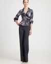 EXCLUSIVELY AT SAKS. This optic printed silk satin blouse is tailored with an artful twist-front detail.Point collarV necklineTwist front detailThree-quarter sleeves with button cuffsSide and back ruching94% silk/6% elastaneDry cleanMade in Italy of imported fabricModel shown is 5'11(180cm)wearing US size 4. 