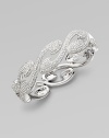 EXCLUSIVELY AT SAKS. Dazzling wave-shaped swirls set with pavé crystals form a head-turning bangle bracelet.Crystal Rhodium plated Diameter, about 2¼ Hinged with push-lock clasp Imported