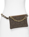 Luxury, it's a cinch with this chain trimmed MICHAEL Michael Kors belt bag, which works an unapologetic glamour with its gleaming hardware and attached leather pouch.
