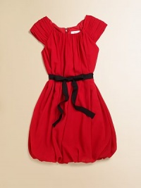 A striking, shirred frock with ribbon tie and bubble hem for your little lady in red.JewelneckShirred cap sleevesBack zipperWaistband with ribbon tieBubble hemFully linedPolyesterHand washImported