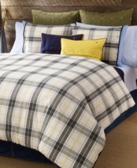 Tommy Hilfiger's Lake George duvet cover set features a classic plaid design in olive, blue and ivory tones accented with pops of yellow. Finished with blue tape binding for a clean look. Reverses to solid. Tommy Hilfiger's Lake George duvet cover set features a classic plaid design in olive, blue and ivory tones accented with pops of yellow. Finished with blue tape binding for a clean look. Reverses to solid.