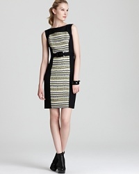 Classic tweed gets a modern makeover with a zigzag print on this Mllly sheath dress, adorned with an attached black belt with glossy buckle. Solid side panels are ultra-slimming, while an exposed back black zipper adds a subtle touch of edge. Classic tweed gets a modern makeover with a zigzag print on this Mllly sheath dress, adorned with an attached black belt with glossy buckle. Solid side panels are ultra-slimming, while an exposed back black zipper adds a subtle touch of edge.