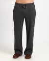 Designed for maximum comfort and fit, the cotton interlock of this lounge pant features a smooth finish and natural stretch with elegant style.Drawstring tie-waistSide slash, back welt pocketsInseam, about 32CottonMachine washImported