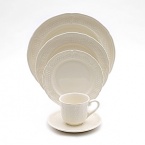 In 1821, Gien was founded for the purpose of bringing fine English earthenware manufacturing techniques to France. Pont Au Choux White is an ivory dinnerware collection with intricate inlaid design work.