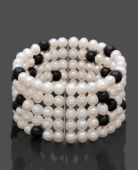 Startling specks of black in a white silhouette. This contrasting cuff will liven up your wardrobe. Bracelet features five rows of black and white cultured freshwater pearls (6-7 mm) in a sterling silver setting. Approximate length: 7 inches. Startling specks of black in a white silhouette. This contrasting cuff will liven up your wardrobe. Bracelet features five rows of black and white cultured freshwater pearls (6-7 mm) in a sterling silver setting. Approximate length: 7 inches.