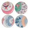 The latest addition to the Wedgwood Harlequin Tea Story, the Butterfly Bloom tidbit plates feature vintage-inspired colors, patterns and shapes finely detailed on bone china with elegant gold rims. They're exquisitely boxed in signature Wedgwood packaging to make a fabulous gift for any true tea lover.