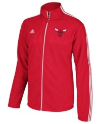 Take your best shot and support your favorite NBA basketball team with this Chicago Bulls jacket from adidas. Take your best shot and support your favorite NBA basketball team with this Chicago Bulls jacket from adidas.