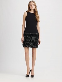 An exquisite design that combines classic tailoring with decidedly modern appeal. This woven dress features an elongating dropped waist, shaping seams and a whimsical, feather-enhanced skirt.Round neckSleevelessPrincess seamsDropped waistFeather-detail skirtConcealed back zipperAbout 21 from natural waistPolyester/rayon/spandexDry cleanImportedSIZE & FIT Model shown is 5'11 (180cm) wearing a US size 4. An exquisite design that combines classic tailoring with decidedly modern appeal. This woven dress features an elongating dropped waist, shaping seams and a whimsical, feather-enhanced skirt.Round neckSleevelessPrincess seamsDropped waistFeather-detail skirtConcealed back zipperAbout 21 from natural waistPolyester/rayon/spandexDry cleanImportedSIZE & FIT Model shown is 5'11 (180cm) wearing a US size 4.