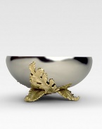 A gleaming addition to any table, handcrafted by European artisans in polished stainless steel with 24k gold gilded leaves at the base. From the Lamina Collection 12 diam. Hand wash Imported