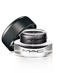 Ultra-smooth, Fluidline' s gel formula provides the precision of a liquid liner with a silkier, softer finish. Goes on foolproof; with a brush in an easy dip-and-stroke action. Long-wearing. Smudge-proof. Lines up in a rich array of colors and finishes. Brush sold separately. Ultra-smooth, Fluidline' s gel formula provides the precision of a liquid liner with a silkier, softer finish. Goes on foolproof; with a brush in an easy dip-and-stroke action. Long-wearing. Smudge-proof. Lines up in a rich array of colors and finishes. Brush sold separately.