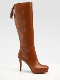 Leather silhouette with goldtone hardware and tassel and bamboo details. Self-covered heel, 3½ (90mm) Self-covered platform, ½ (15mm) Compares to a 3 heel (75mm) Shaft, 16½ Back zip Leather upper Leather lining Padded insole ImportedOUR FIT MODEL RECOMMENDS ordering one half size up as this style runs small. Leather silhouette with goldtone hardware and tassel and bamboo details. Self-covered heel, 3½ (90mm) Self-covered platform, ½ (15mm) Compares to a 3 heel (75mm) Shaft, 16½ Back zip Leather upper Leather lining Padded insole ImportedOUR FIT MODEL RECOMMENDS ordering one half size up as this style runs small.