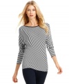 MICHAEL Michael Kors' dolman top adds instant electricity to your ensemble with its striking diagonal stripes.
