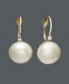 There's nothing more elegant than pearls with a hint of diamond. These cultured freshwater pearl drops (10-1/2 - 11 mm) with round-cut diamond (1/3 ct. t.w.) are a gift she will cherish for a lifetime. Earrings crafted in 14k gold. Approximate drop: 3/4 inch.