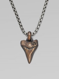 A shark's tooth pendant is handsomely craft, lending to lend a new look to any man's collection. From the Small Amulet Collection Titanium Bronze 2.7mm box chain length, 22 Lobster clasp Imported 