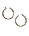 Let chic silver loops orbit your lobes. Stylish and timeless, simple hoops are the perfect addition to your accessory collection. Lucky Brand earrings crafted in silver tone mixed metal. Approximate diameter: 1 inch.