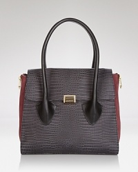 It's the major bag on our must list. This leather-crafted Pour La Victoire satchel is a prime (and perfectly proportioned) piece for days that demand a bag that can truly carry it all. It's the major bag on our must list. This leather-crafted Pour La Victoire satchel is a prime (and perfectly proportioned) piece for days that demand a bag that can truly carry it all.