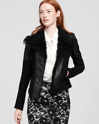 Crafted from luxuriously-warm lamb shearling, this super chic Theory jacket, merges uptown sophistication with downtown european flair. Crafted from luxuriously-warm lamb shearling, this super chic Theory jacket, merges uptown sophistication with downtown european flair.