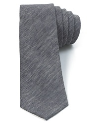 Theory combines vintage inspiration with a narrow width for an understated, always sophisticated modern tie, rendered in textured linen for a soft hand. Theory combines vintage inspiration with a narrow width for an understated, always sophisticated modern tie, rendered in textured linen for a soft hand.