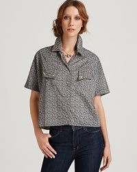We give props to this boxy cropped style with snaps through the front and on the pockets, cuffs and collar! Worn over a white tank with denim, the menswear-inspired look will impress all the boys... how ironic? We give props to this boxy cropped style with snaps through the front and on the pockets, cuffs and collar! Worn over a white tank with denim, the menswear-inspired look will impress all the boys... how ironic?