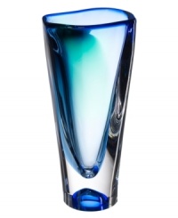 An elegant fluidity in shades of the sea gives this Vision vase from Kosta Boda an ethereal quality that's truly mesmerizing. Royal and azure blues deepen and fade in heavy art glass with a tall, asymmetrical shape and endless allure. An elegant fluidity in shades of the sea gives this Vision vase from Kosta Boda an ethereal quality that's truly mesmerizing. Royal and azure blues deepen and fade in heavy art glass with a tall, asymmetrical shape and endless allure.