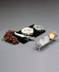 A handsome and elegant way to serve your favorite cheeses at your next dinner party or wine tasting. This three piece set includes a marble serving board with a sculpted metal handle, cheese knie and cracker tray. All feature Arthur Court's beautiful sculpted grape and vine motif. A handsome and elegant way to serve your favorite cheeses at your next dinner party or wine tasting. This three piece set includes a marble serving board with a sculpted metal handle, cheese knie and cracker tray. All feature Arthur Court's beautiful sculpted grape and vine motif.