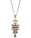 Amp up your glamour factor in Givenchy's stunning y-shaped pendant. Crafted in brown gold-plated mixed metal, pendant features glass pearls in blush and white tones. Approximate length: 16 inches + 3-inch extender. Approximate drop: 2-9/10 inches.