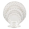Kate Spade's Larabee Road Platinum, peppered with platinum polka dots, will give your table its own personality. Crafted of white bone china, each piece is dishwasher safe.