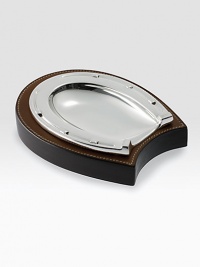 Cast in a horseshoe shape, this essential trinket tray is a rustic yet refined addition to the well-appointed desk. 5½W X 6LSilverplated brass and saddle leatherImported