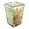 Tapered glass candle with antique boquet image and vintage pattern. Approximately 40-hour burn time.