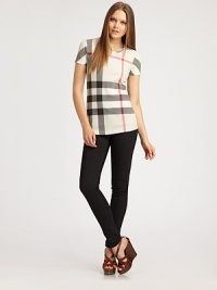 Allover checks give this classic stretch cotton style iconic appeal.Round neckShort sleevesPull-on styleAbout 24 from shoulder to hem95% cotton/5% elastaneMachine washImportedOUR FIT MODEL RECOMMENDS ordering one half size up as this style runs small. Allover checks give this classic stretch cotton style iconic appeal.Round neckShort sleevesPull-on styleAbout 24 from shoulder to hem95% cotton/5% elastaneMachine washImportedOUR FIT MODEL RECOMMENDS ordering one half size up as this style runs small.