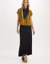 A boxy-yet-feminine fit and sporty, rolled sleeves give this hemp-organic cotton shirt must-have appeal.Round neckShort sleevesPull-on styleBoxy fitAbout 20 from shoulder to hem55% hemp/45% organic cottonMachine washImported