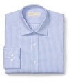 Classic stripes deliver crisp style with this dress shirt from Michael Kors.