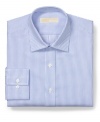Classic stripes deliver crisp style with this dress shirt from Michael Kors.