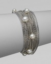 From the Pearl Collection. Multiple rows of sterling silver box chains with a random array of pearls.Pearl Sterling silver Length, about 7½ Push lock clasp closure Imported 