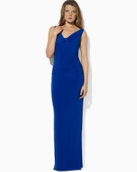 A draping cowl neckline on the Ulli dress, tailored from sleek matte jersey with a hint of stretch for a flattering, floor-grazing fit, exudes chic, sophisticated style. A draping cowl neckline on the Ulli dress, tailored from sleek matte jersey with a hint of stretch for a flattering, floor-grazing fit, exudes chic, sophisticated style.