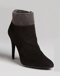 Stuart Weitzman takes his sophisticated booties over the top in term of style, with contrast cuffs that set this pair apart from the rest. Stuart Weitzman takes his sophisticated booties over the top in term of style, with contrast cuffs that set this pair apart from the rest.