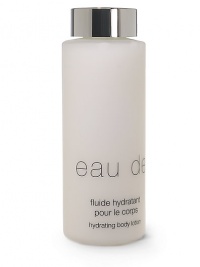 The sparkling opulence, the sheer elegance of Eau de Cartier is yours to enjoy in a luxurious body lotion. Experience its sensuality in a floral blend of violet and lavender leaves with amber, musk, cedar and patchouli notes. 6.75 oz. Made in France. The sparkling opulence, the sheer elegance of Eau de Cartier is yours to enjoy in a luxurious body lotion. Experience its sensuality in a floral blend of violet and lavender leaves with amber, musk, cedar and patchouli notes. 6.75 oz. Made in France.