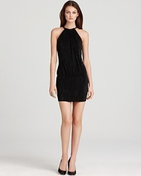 Articulated with intricate accordion-style pleating, this Laundry by Shelli Segal dress touts a chain-detail neckline for added edge. Articulated with intricate accordion-style pleating, this Laundry by Shelli Segal dress touts a chain-detail neckline for added edge.