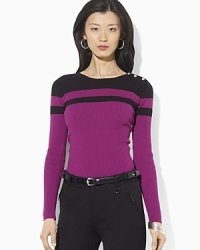 A soft ribbed top is crafted with bold color-blocking to create a sleek, modern look. A soft ribbed top is crafted with bold color-blocking to create a sleek, modern look.