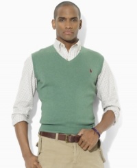 Knit from luxuriously soft Pima cotton yarns in a classic jersey stitch, this classic-fitting sweater vest is a preppy essential for the modern man's wardrobe. Knit from luxuriously soft Pima cotton yarns in a classic jersey stitch, this classic-fitting sweater vest is a preppy essential for the modern man's wardrobe.